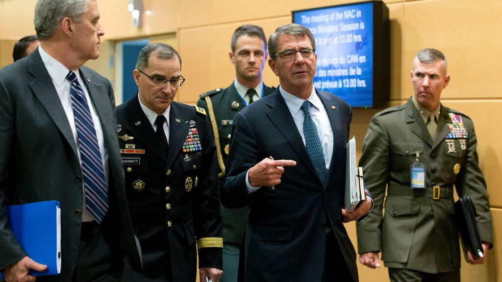 US secretary of defense Ash Carter (second right) with members of his delegation prior to a meeting on Thursday at Nato headquarters in Brussels. Photograph: Virginia Mayo/AFP/Getty Images