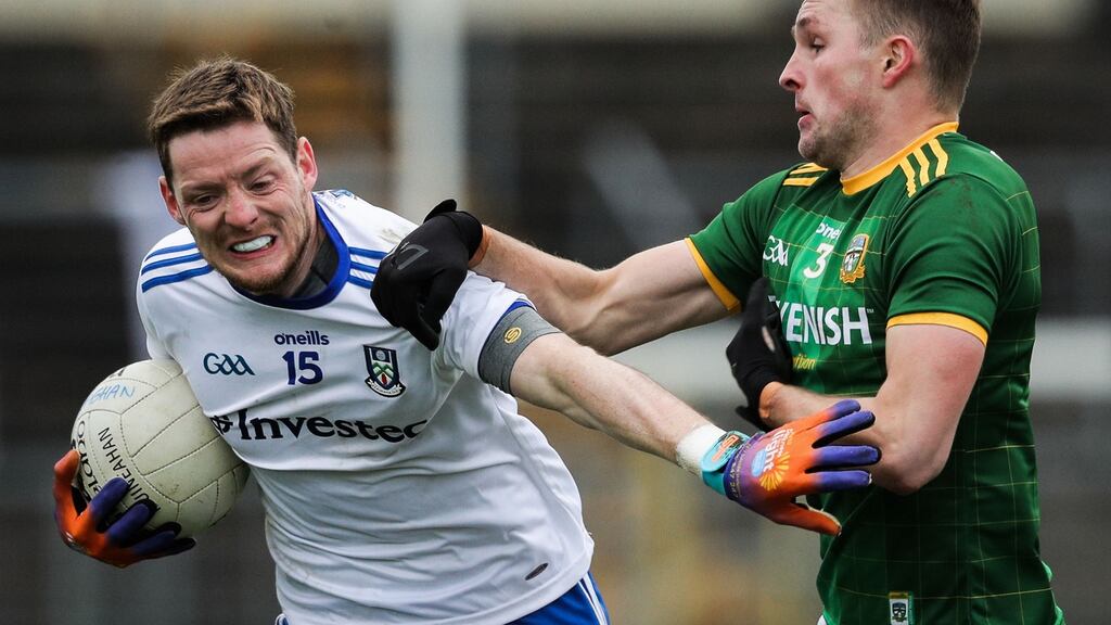 Conor McManus is challenged by Conor McGill during Monaghan’s draw with Meath. Photograph: Inpho