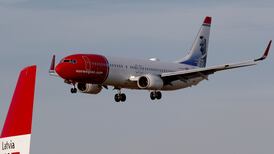 Norwegian Air to cut 4,000 flights, lay off half its employees