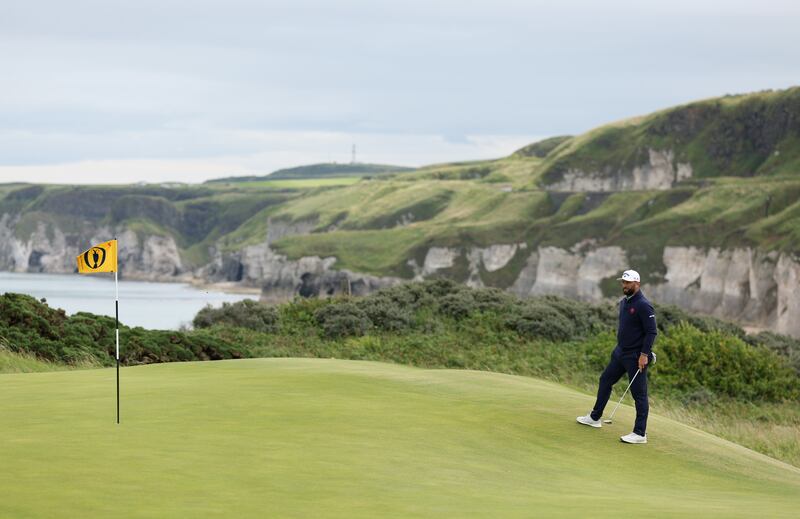Jon Rahm of Spain lines up a putt on the fifth green during his first round. Photograph: Richard Heathcote/Getty Images