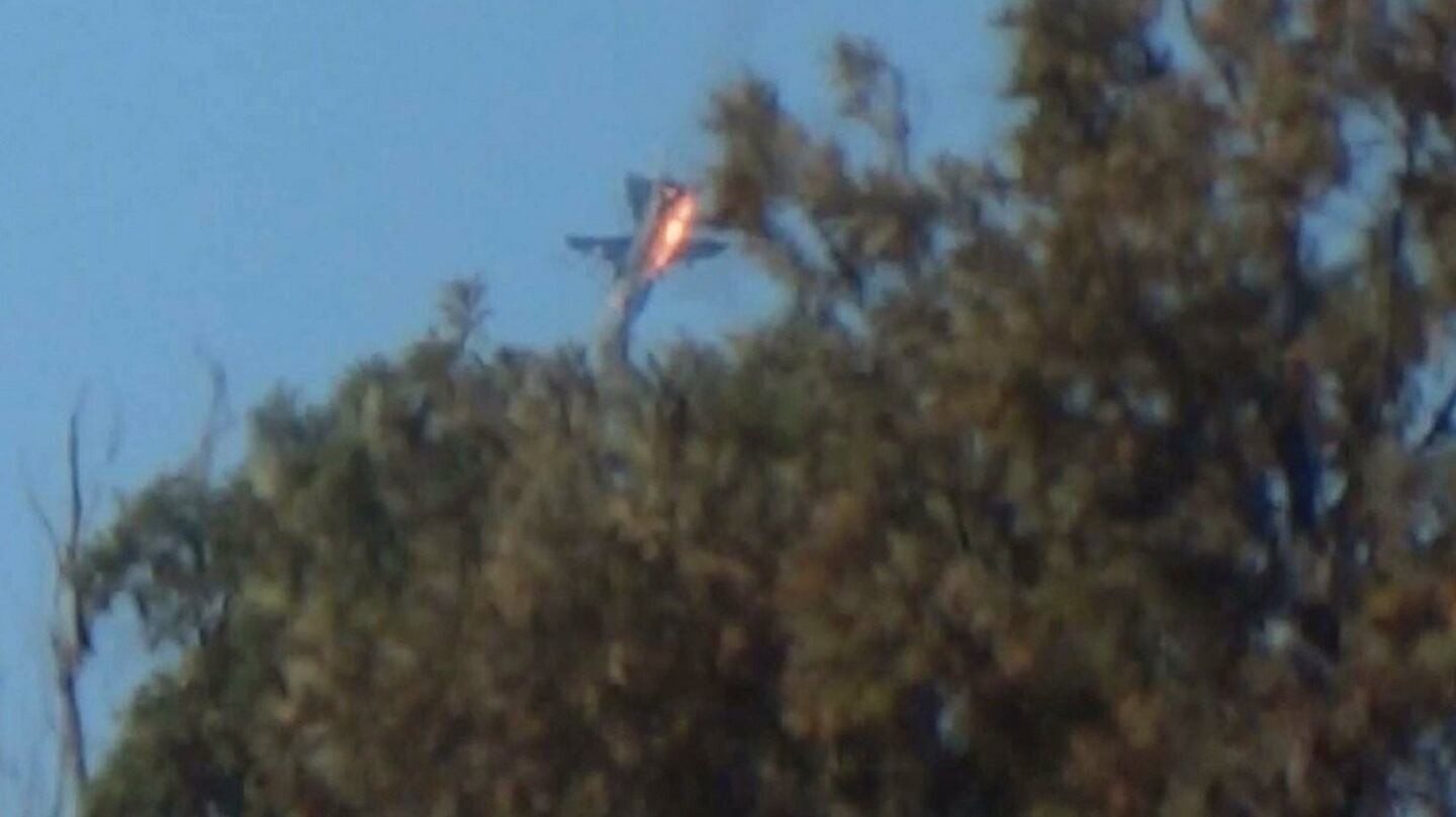 A war plane crashes in flames in a mountainous area in northern Syria after it was shot down by Turkish fighter jets near the Turkish-Syrian border. Photograph: Sadettin Molla/Reuters