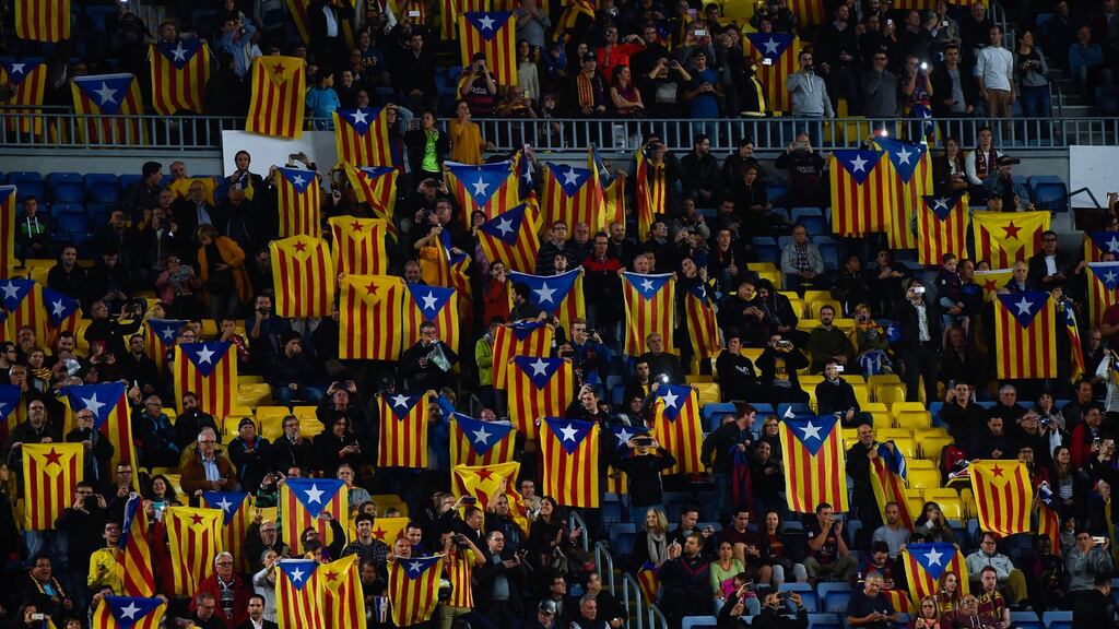 Barcelona supporters hold Pro-Independence Catalan flags during the Champions League match against FC Bate Borisov at the Camp Nou in November 2015. Photograph: David Ramos/Getty Images