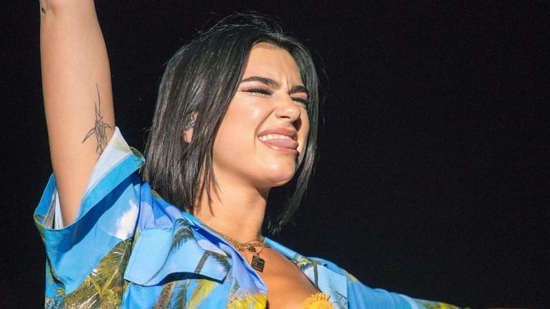 Dua Lipa: she gets away with wearing a bra and open wavy shirt on a September night in Laois, making it feel like a fashion statement rather than an attempt to catch pneumonia. Photograph: Dave Meehan