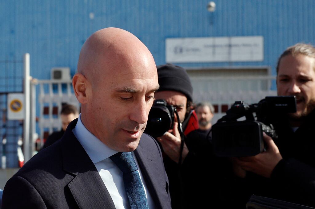 Members of the media surround former president of the Spanish football federation Luis Rubiales. Photograph: Oscar del Pozo/Getty