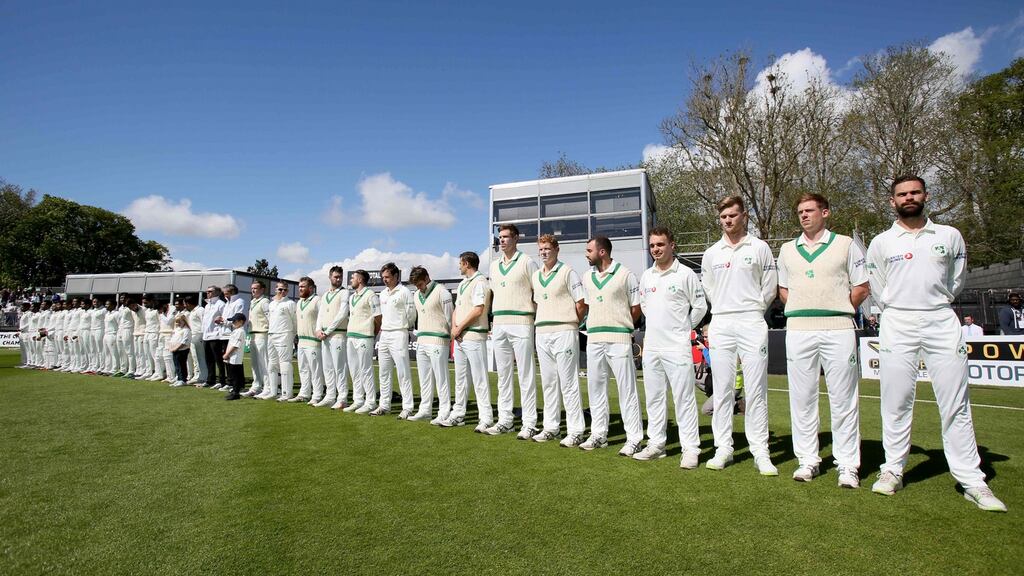 Pakistan and Ireland’s players line up on the field before play on day two of Ireland’s inaugural test match at Malahide cricket club. Photograph: Getty Images