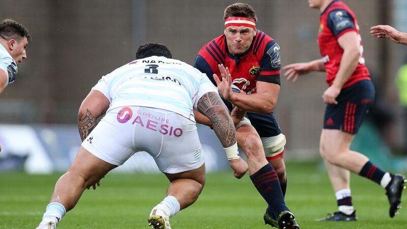 Munster’s CJ Stander runs into the challenge of Racing’s Ben Tameifuna during the Champions Cup game at Thomond Park. Photograph: Billy Stickland/Inpho