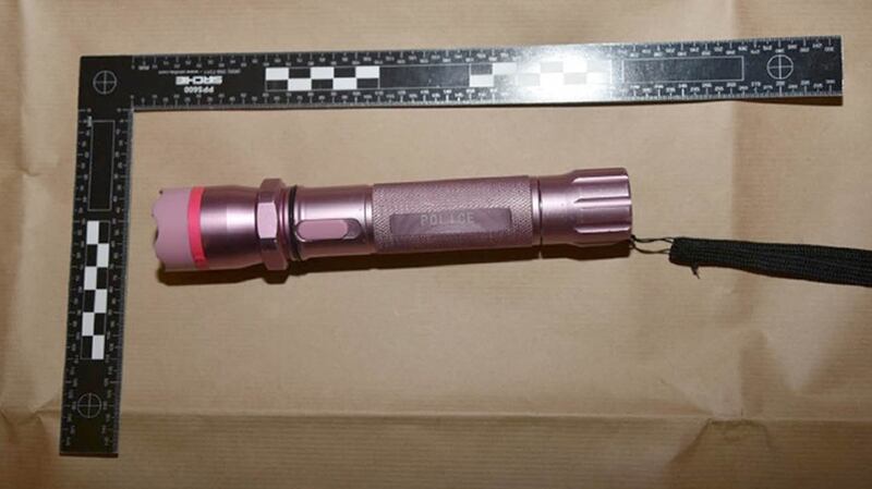 National Crime Agency undated handout photo of the illegal 10,000-volt stun gun disguised as a torch. Photograph: NCA/PA