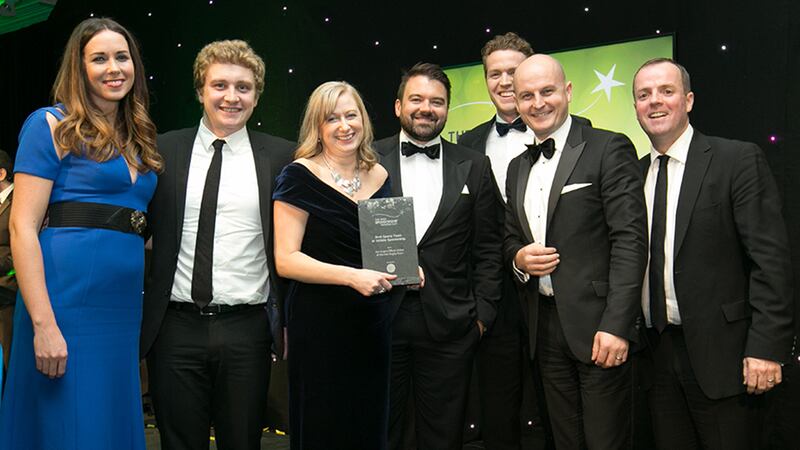 Daragh Persse, Founder, The Brand Fans, presents the Best Sports Team or Athlete Sponsorship award to Aer Lingus team.