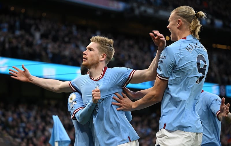 Kevin De Bruyne  celebrates scoring the opening goal against Arsenal along with Erling Haaland. Arsenal could not cope with the duo during City's outstanding display at the Etihad Stadium. Photograph: Oli Scarff/AFP/Getty