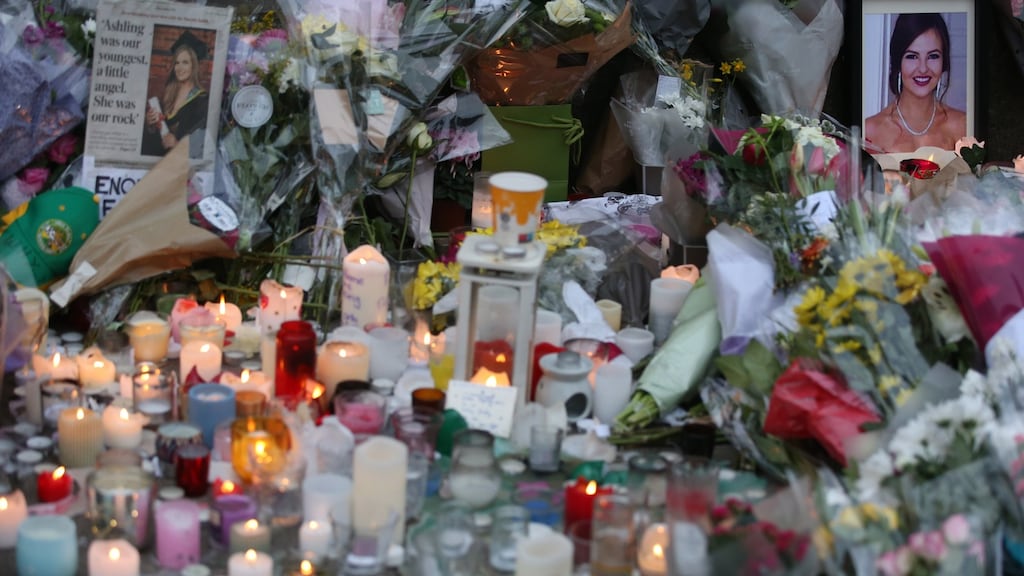 Flowers, messages and candles left at a memorial outside Leinster House for Ashling Murphy, who was murdered in Tullamore on Wednesday. Photograph: Stephen Collins/Collins Photos
