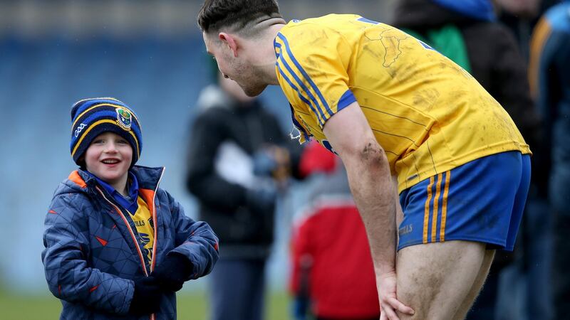 Neil Collins greets a young Roscommon fan. Photograph: Inpho