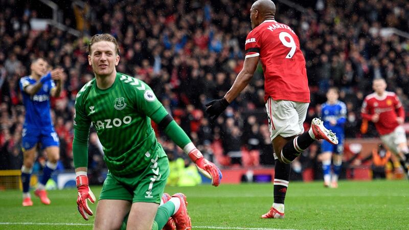 Jordan Pickford reacts as Anthony Martial celebrates. Photo: Oli Scarff/AFP via Getty Images