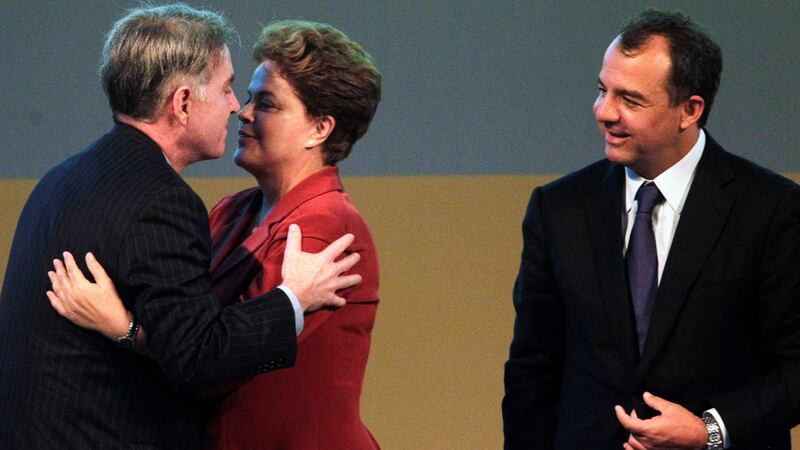 Eike Batista greets then president Dilma Rousseff in 2012, while Sergio Cabral, then governor of Rio de Janeiro, looks on. Mr Cabral is now in prison, facing corruption charges. Photograph: Ricardo Moraes/Reuters