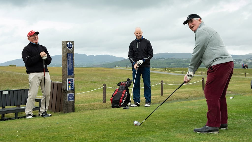 Three brothers, (from left) Bosco, Gerard and Charlie Kelly from Derry tee off on the 12th hole at North West GC, Lisfannon, Co Donegal. Photograph: Joe Dunne