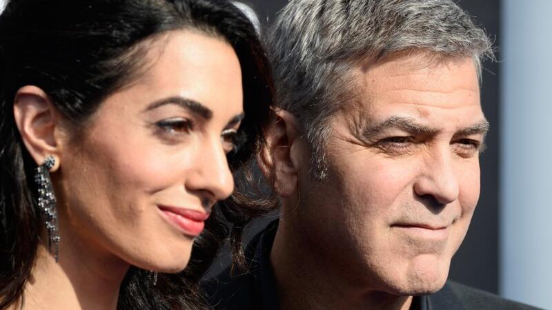 All was well in the world of the Clooneys. Photographs: Frazer Harrison/Getty Images