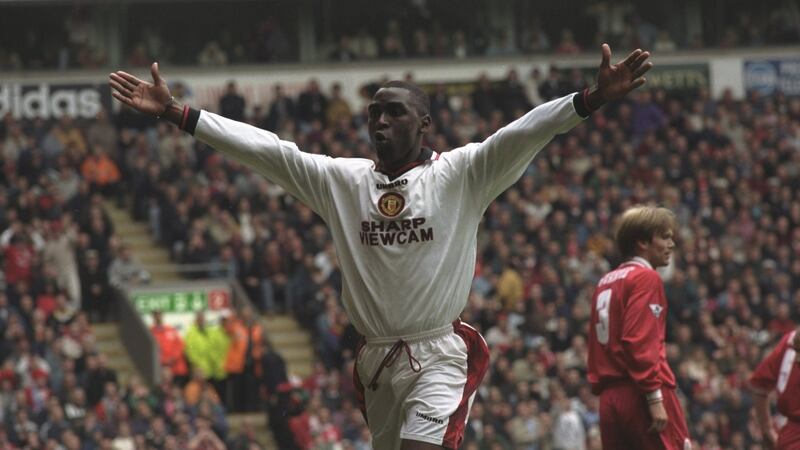 Cole celebrates scoring during United’s 3-1 win over Liverpool in 1997. Photo: Ross Kinnaird /Allsport