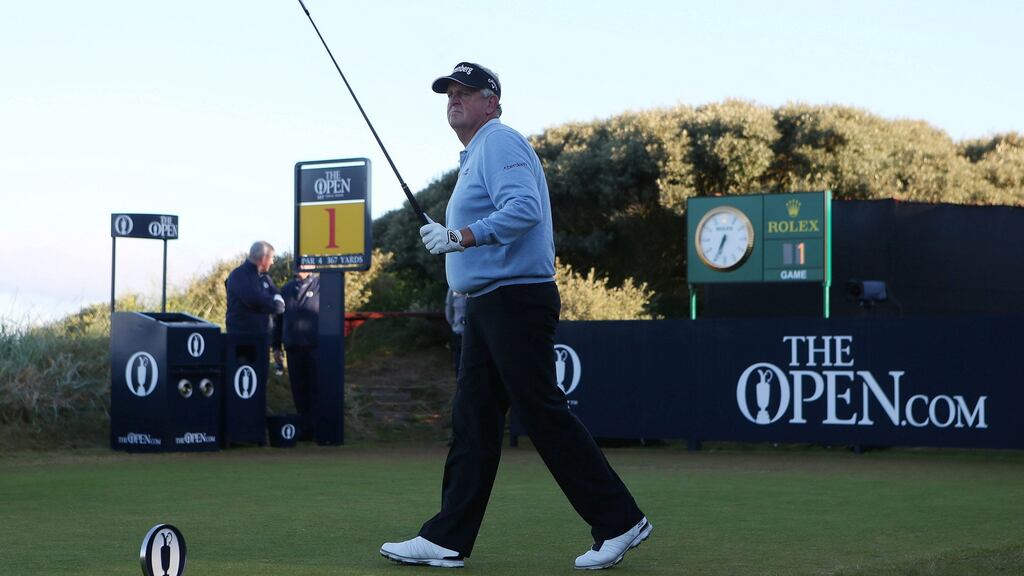 Colin Montgomerie walks off the first tee during the first round - Royal Troon, Scotland. Photograph: Russell Cheyne/Reuters