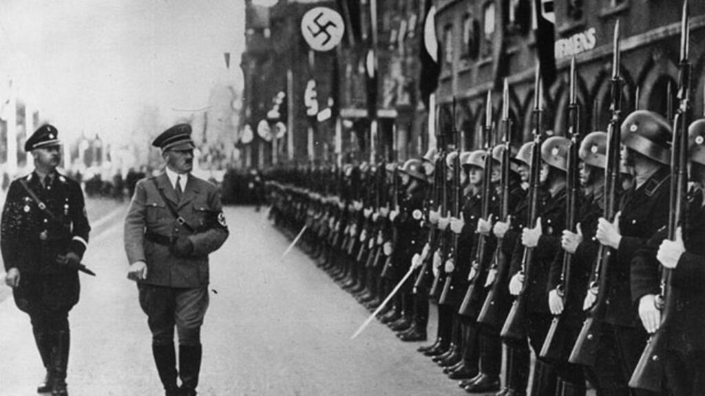 Adolf Hitler and his chief of police Heinrich Himmler inspecting the SS Guard. Photograph: Getty Images