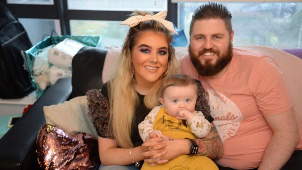 Jasmine Frances Mooney, with her baby Elijah Robert and partner Georgie Goulding Browne, at home in Ashtown, Dublin. Photograph: Dara Mac Dónaill / The Irish Times