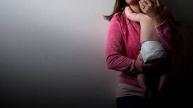 Childminder appeared to bite infant in face, court told