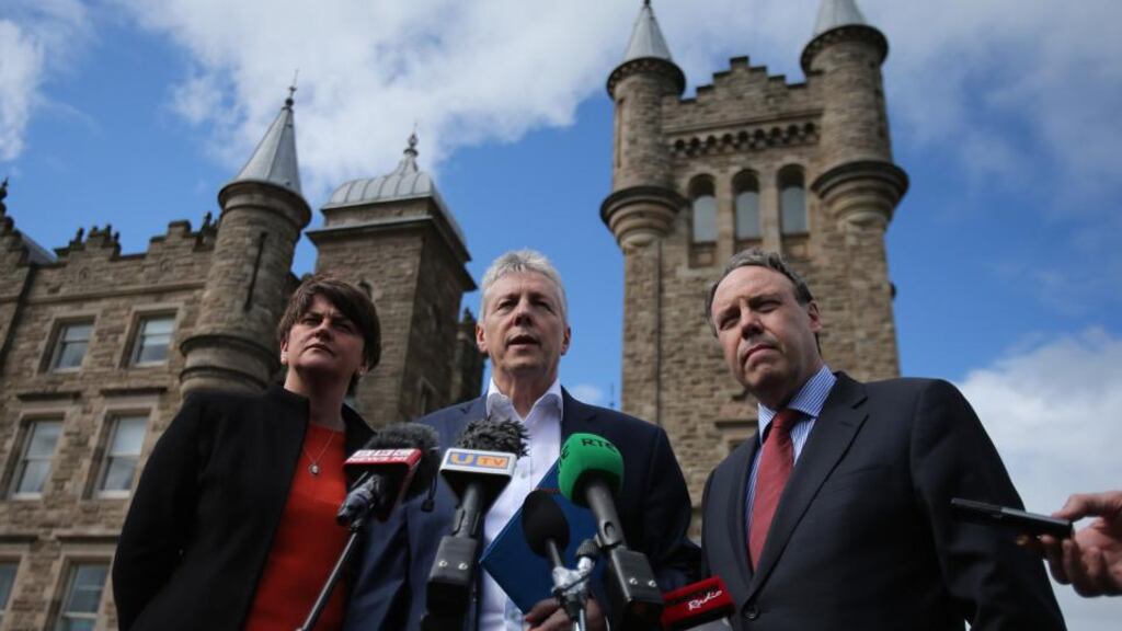 The DUP’s Arlene Foster, leader Peter Robinson and Nigel Dodds hold a press conference outside Stormont Castle on the way into talks in Belfast on Tuesday, June 2nd, involving the UK and Irish governments and leaders of the five Executive parties being convened in a bid to find a way to save the Stormont House Agreement. Photograph: Niall Carson/PA Wire