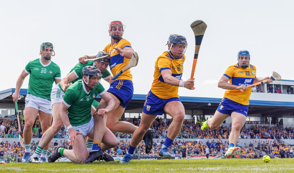 Limerick’s Sean Finn, Diarmaid Byrnes and Declan Hannon with Peter Duggan, David Reidy and Shane O’Donnell of Clare in the Munster championship at Cusack Park, Co Clare. Photograph: James Crombie/Inpho