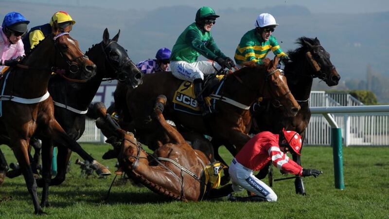 Ruby Walsh falls from Abbyssial, suffering an arm injury in the process. Photograph: Tim Ireland/PA Wire