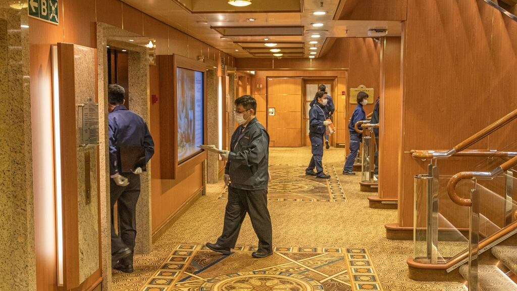 Quarantine officials on the Diamond Princess cruise ship that has been quarantined in Japan. Photograph: David Abel/Facebook/PA Wire