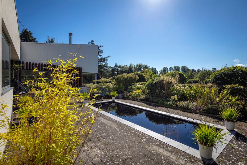 Reflective pond: The site and views give peace and tranquillity, and the only traffic passing the house is recreational.