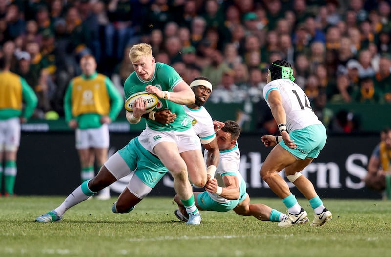 Ireland's Jamie Osborne is tackled by South Africa's Siya Kolisi. Photograph: Dan Sheridan/Inpho