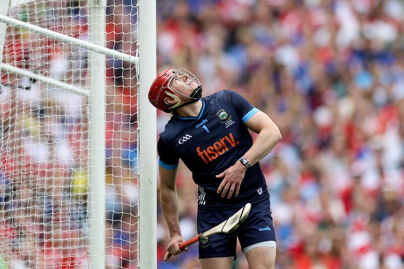 Tipperary's goalkeeper Rhys Shelly watches as a Cork shot hits the upright. Photograph: Laszlo Geczo/Inpho