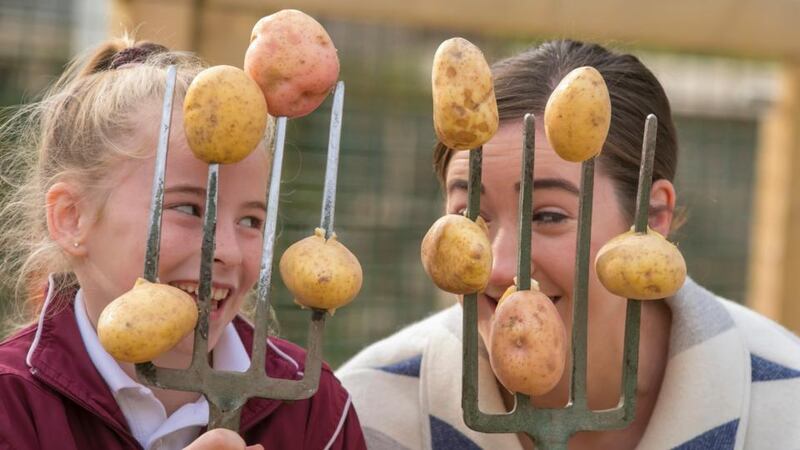 National Potato Day: Theresa Donohoe from Arles National School, in Co Laois, celebrates the spud with Deirdre O’Shea of Agri Aware. Photograph: Patrick Browne