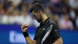 Novak Djokovic overcomes back issue to cruise past Cameron Norrie at US Open