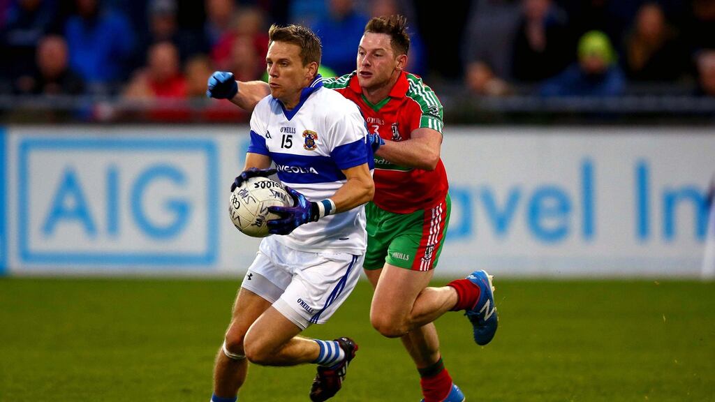 omas Quinn of Vincent’s with Philly McMahon of Ballymun. Photograph: Donall Farmer/Inpho