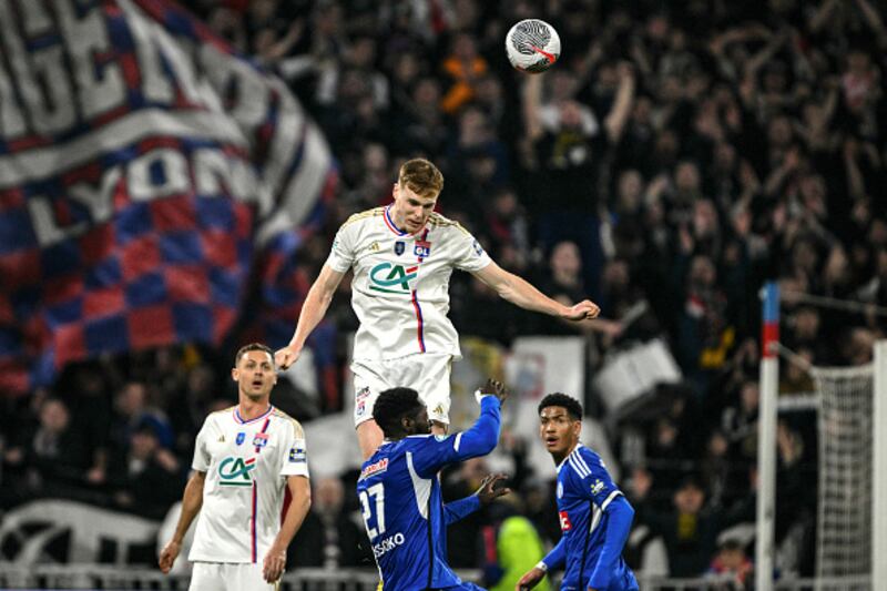 Jake O'Brien clears while defending for Lyon. Photograph: Jeff Pachoud/AFP via Getty Images