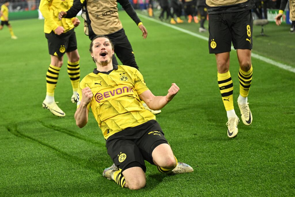 Dortmund's Austrian midfielder Marcel Sabitzer celebrates scoring the winner against Atletico Madrid. Photograph: Ina Fassbender/AFP via Getty Images