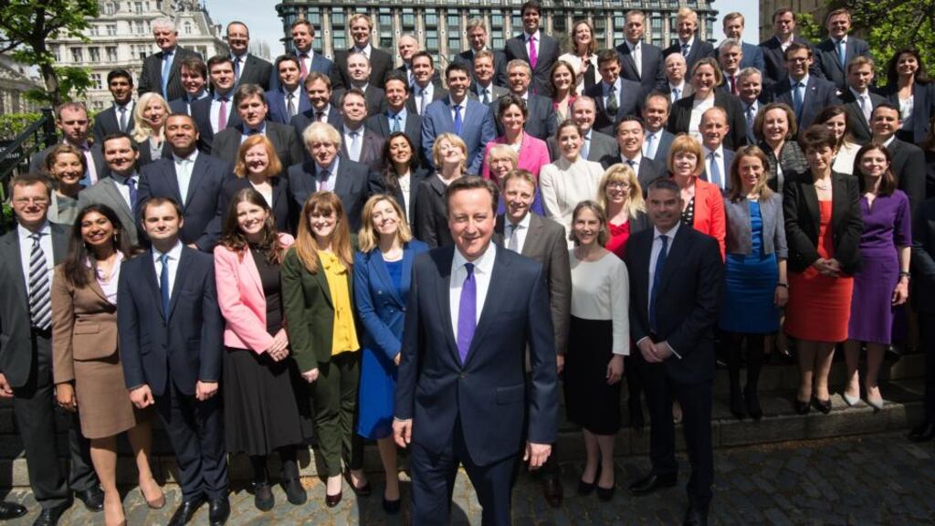British Prime Minister David Cameron poses for a group photo with newly-elected Conservative MPs at the Houses of Parliament in central London. Photograph: AFP/Getty Images