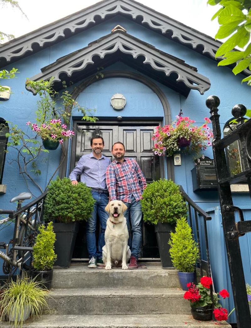 Jonathan Healy and Pawel Audrzejewski and their dog, Bowie