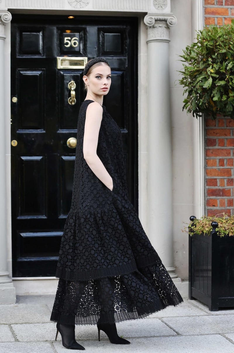 Louise Kennedy autumn-winter 2019: model Dioni Tabbers wears a Raquel geometric floor-length lace dress and Wren long beaded fringe corsage; prices on application. Photograph: Sasko Lazarov/Photocall Ireland
