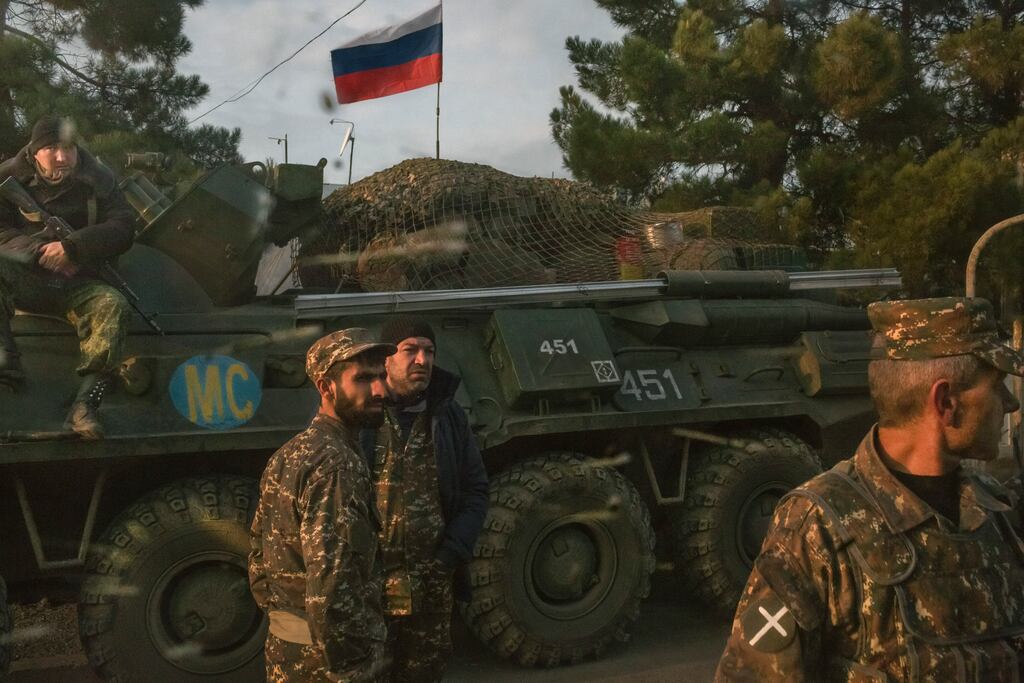Armenian soldiers and a Russian peacekeeping soldier on a vehicle, at a checkpoint in Nagorno-Karabakh in 2020. Fighting has erupted between Armenia and Azerbaijan, the latest flare-up in their decades-long confrontation. File photograph: Mauricio Lima/The New York Times