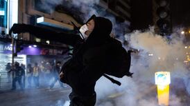 Hong Kong pro-democracy activists keep up protests on Christmas Day