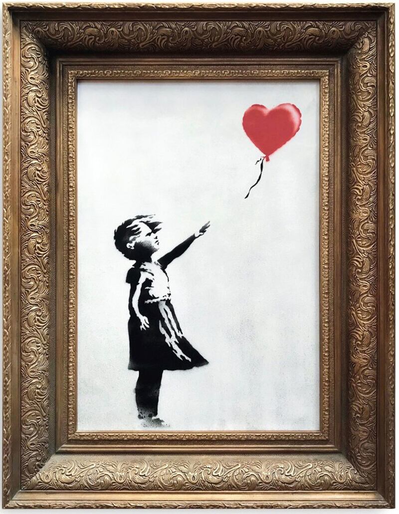 Handout photo issued by Sotheby’s of Banksy’s artwork Girl With Balloon, which shredded itself after being sold for more than £1 million (€1.17 million) at auction. Photograph: Sotheby’s/PA