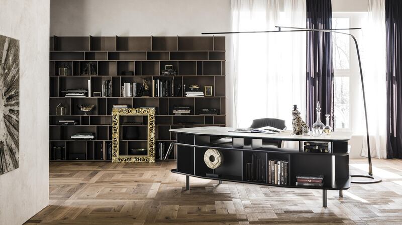 This Wall Street desk offers plenty of ceramic desktop space as well as stylish front of house shelving, in a part of the desk’s form that is utterly under-utilised.