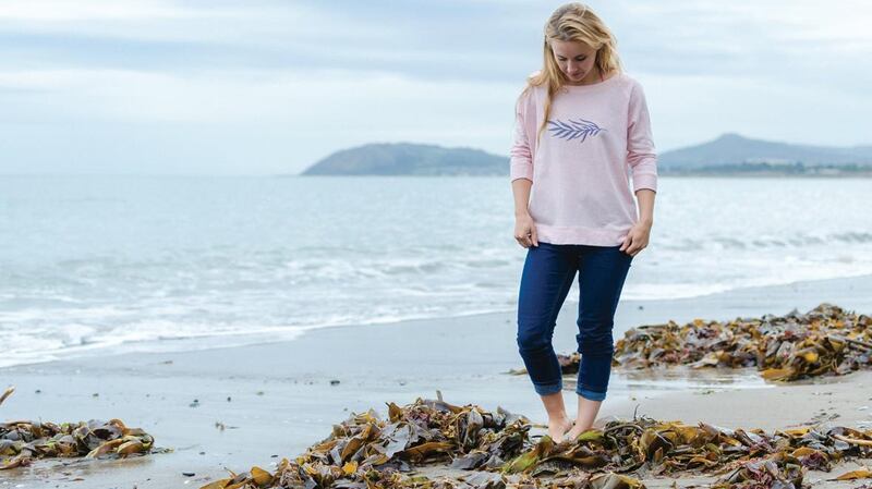 Finn Ni Fhaolain, marine biologist and surfer, wearing an unbrushed fleece in organic cotton from www.grown.ie.