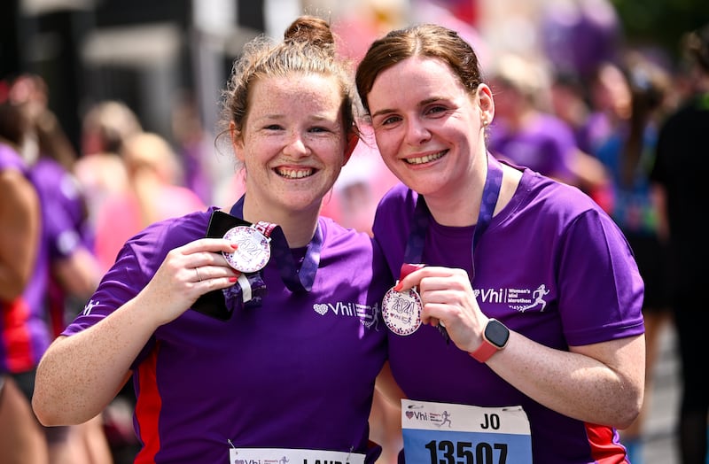 Participants Laura Derkin, and Jo Derkin after the 2024 Vhi Women’s Mini Marathon. Photograph: Ramsey Cardy/Sportsfile