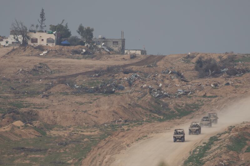 Israeli troops move along the Gaza Strip in Southern Israel. Israel increased air raids in the south of the Gaza Strip, where medicines are expected for hostages held by Hamas and humanitarian aid for the Palestinian population. Photograph: Amir Levy/Getty Images