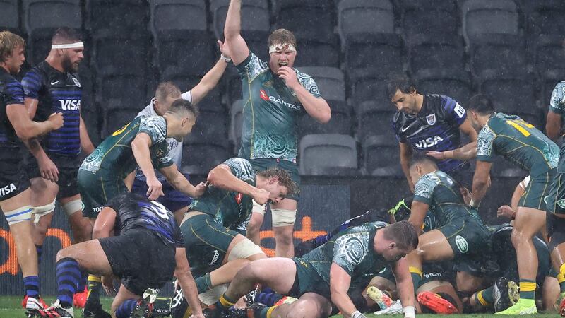 Australian celebrate Michael Hooper’s try against Argentina. Photograph: Daivid Gray/Getty/AFP
