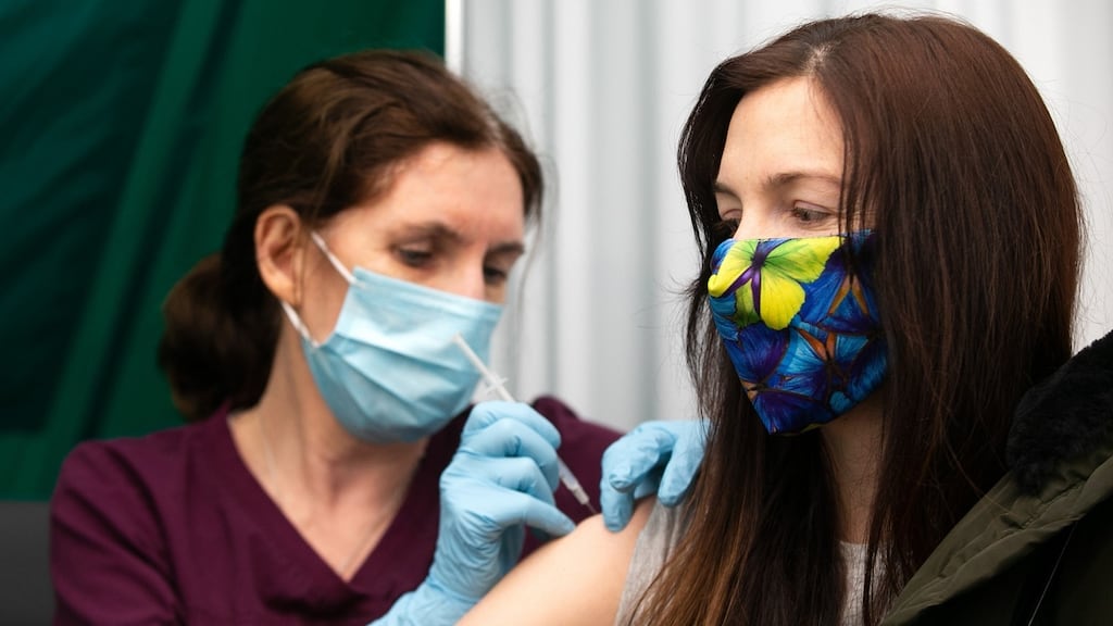 Dr Fiona Moynihan injects Dr Louise Jackman, GP with Grand Canal Hanover Medical Practice, with the Moderna vaccine against Covid-19 at a vaccination centre in Dublin on January 16th. Photograph: Sam Boal/Photocall Ireland/PA Wire