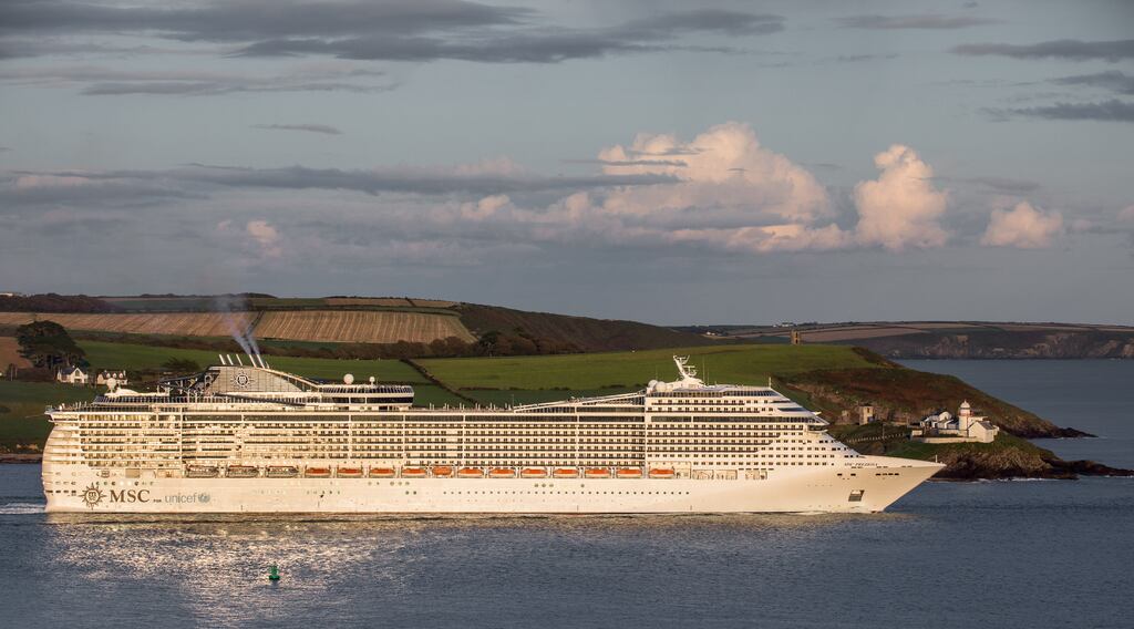 The cruise ship MSC Preziosa passes the Roches Point lighthouse, Co Cork, as she departs for a voyage to Hamburg, Germany. Photograph: David Creedon