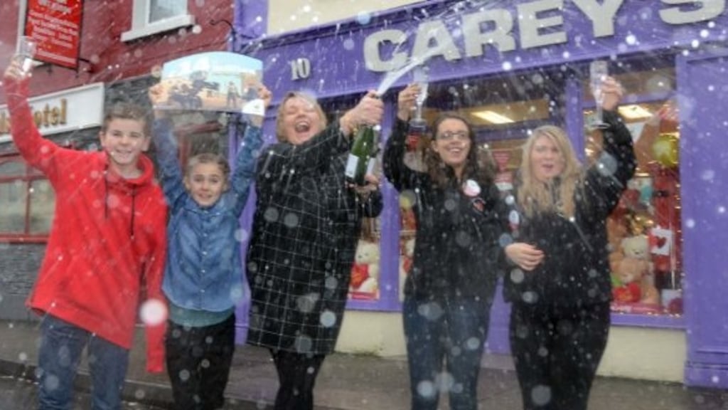 The owner and staff of Careys in Belmullet celebrating selling the winning lottery ticket. The photograph shows owner Lorraine O’Connor (centre) with Billy O’Connor and Molly O’Connor and staff members Sarah Conmy and Hazel O’Connor. Photograph: Paul Mealey